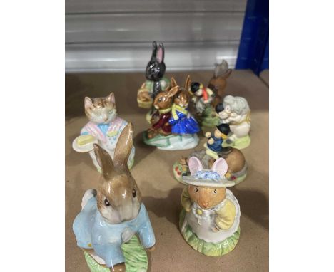 Various Royal Doulton Beatrix Potter and Royal Albert figures, including Santa Bunnykins, Billie and Buntie Bunnykiins, Eeyor