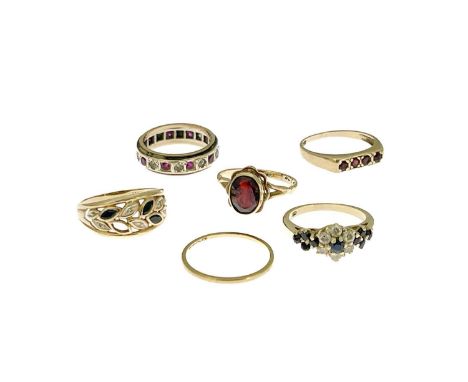 Six gold and gem set rings, including a diamond and sapphire dress ring, an eternity ring and fine gold band etc (6)