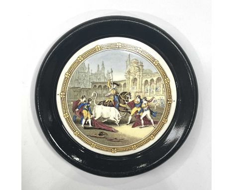 A Kirkhams pottery Prattware style plaque in the form of a pot lid, Bull Fight, 1947, 18.5cm diameter