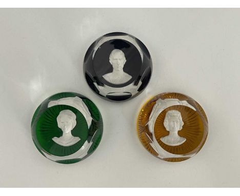 Three Baccarat commemorative glass paperweights, 1976, including the Prince of Wales, Elizabeth II and Princess Anne, each wi