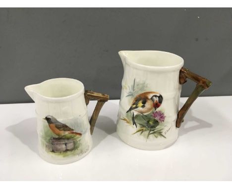 Edward Townsend and George Cole for Royal Worcester, circa 1940, two bird painted barrel jugs, tapered cylindrical form, deco