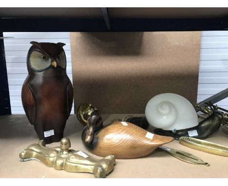 A novelty lamp base, modelled as a snail, the opaque white glass shade on bronzed base, together with brass fire irons, coppe