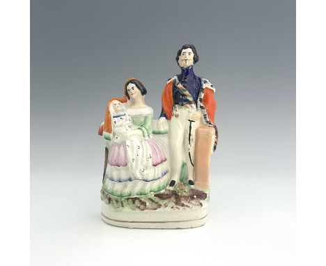 A Staffordshire royal portrait figure group, circa 1860, rarely seen portrait figure group of Napoleon III (b.1808), modeled 