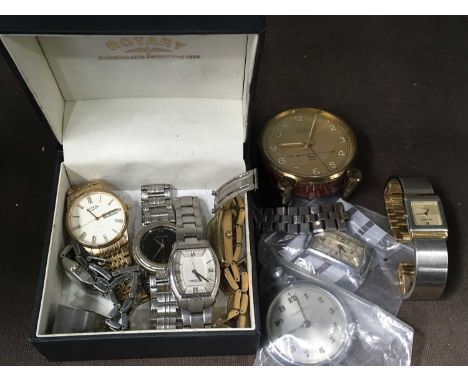 A selection of watches and watch parts, to include an Art Deco Wyler Inclaflex Tank watch head, a stainless steel Eterna brac