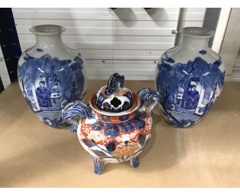 A pair of Chinese blue and white baluster vases, Qianlong seal marks to bases, 21cm high, and an Imari triple-footed koro (3)