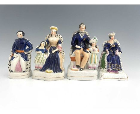 Four Staffordshire royal figure groups, circa 1840, including Queen Victoria, possibly at her coronation, enthroned in green 