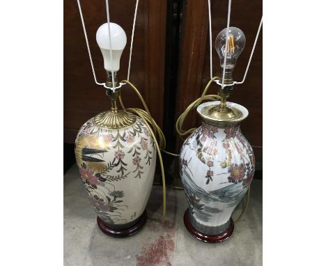 Two Rochamp Chinese style lamp bases, baluster and shouldered forms, each decorated with peonies and birds, heightened in gil