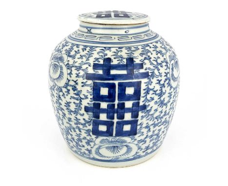 A Chinese blue and white 'marriage' ginger jar and ceramic cover, Qing Dynasty, painted characters on a ground of blossoming 