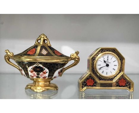 A Royal Crown Derby Old Imari pattern solid gold band desk clock, 10cm high, together with a Royal Crown Derby twin handled b