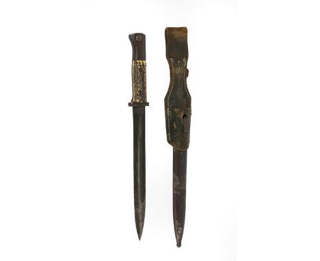 A German M1884/98 Second Pattern Knife Bayonet, the 25.5cm blued fullered steel blade with crowned W and dated (19)17 and ins