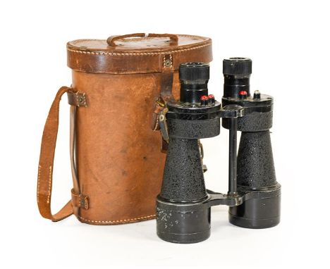 A Pair of Second World War Nottingham Instruments Ltd. Mk5 X7 Binoculars, dated 1944, with maker's logo and broad arrows, wit