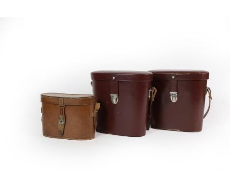 Two Pairs of Carl Zeiss, Jena Jenoptem 10 x 50W,  Binoculars,  each with blackened finish, with crinkle grips and leather str