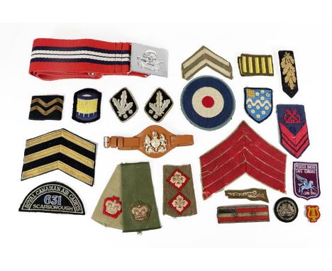 A Large Quantity of Miscellaneous Insignia, including slip-on shoulder rank straps, chevrons, shoulder titles, rank pips, tra