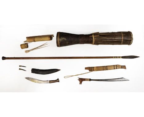 A Borneo Sumpitan, with steel blade bound to the wood haft with wicker, together with a bamboo quiver of darts; a Dyak Mandau