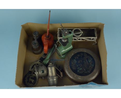 A carbide cycle lamp, a vintage oil can, a biscuit tin, table top mincer, brass binoculars etc