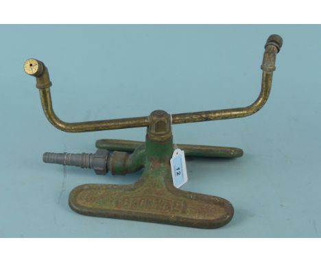 A vintage lawn sprinkler in brass and cast iron by Dron-Wal