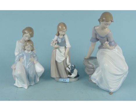 Three Nao porcelain figurines