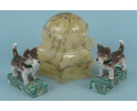 An Art Deco blond marbled glass lamp shade plus a pair of Art Deco Scottie dog bookends (no damage noted)