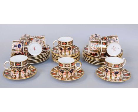 Twelve Royal Crown Derby Coffee Cans, Saucers and Side Plates, decorated in Imari pattern 1128 (one tray)One side plate - ful