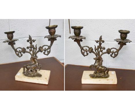 Pair of Bronze Candelabra, circa 1830, each for two lights, with prancing horse to white marble base, 28cm high