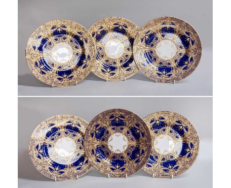 A Set of Six Royal Worcester Porcelain Plates, richly gilded over wide cobalt borders, gilt printed marks, 27cm diameterGood 