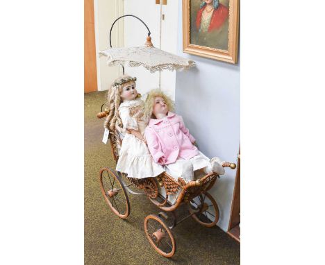 An Armand Marseilles 390 Bisque Head Doll, on composition body and a bisque head doll (later head) on composition body with a