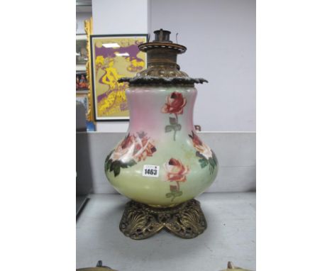 A Late XIX Century American Oil Lamp, the opaque glass bulbous body decorated with pink roses on a shaded green/pink ground, 