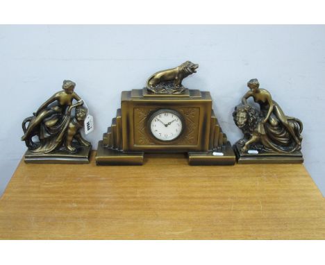Ar Deco Period Plaster Three Piece Clock Garniture Set, the clock  'CF London' with lion surmount, matching maiden on lion si