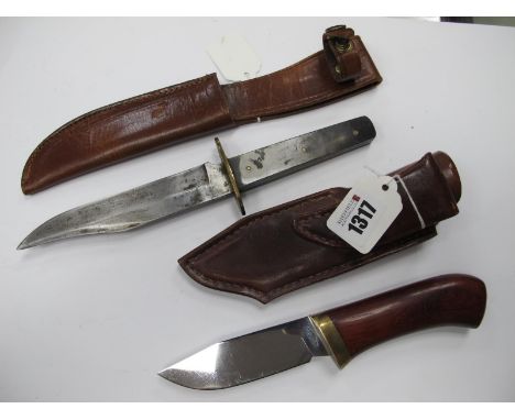Bowie Knife, polished horn scales, brass guard (no name) 26cm long, in brown leather sheath, plus unnamed skinning knife, woo