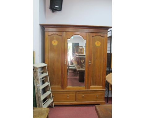 An Early XX Century Walnut Inlaid Wardrobe, with dentil cornice, central mirror, arched door and panelled sides with boxwood 