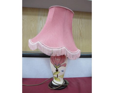 A Moorcroft Pottery Table Lamp, painted in the 'Magnolia' pattern, 46/10 under base.