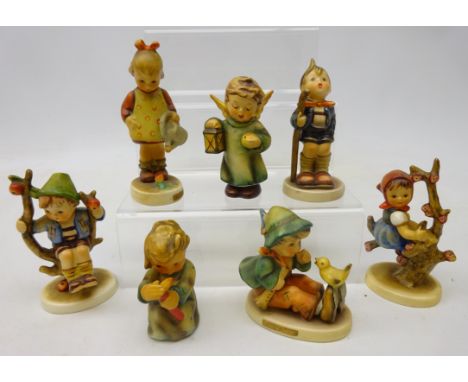 Seven Hummel Goebel figures, 'Singing Lesson', 'Apple Tree Boy', 'Little Gardener', 'Little Hiker' and three others (7)   Con