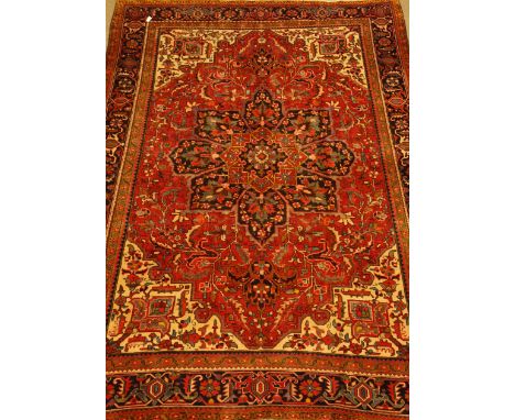 Persian Hamadan red ground rug carpet, with large central medallion on floral field, repeating guarded border, 375cm x 275cm
