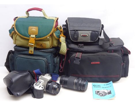 Canon EOS 500N camera with Canon '35-80mm 1:4-5.6' zoom lens, in camera bag, Canon '75-300mm 1:4-5.6 II' zoom lens and three 