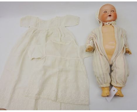German Armande Marseille bisque head doll with composite articulated body, sleeping blue glass eyes, stamped 351/ 6.K, L50cm 