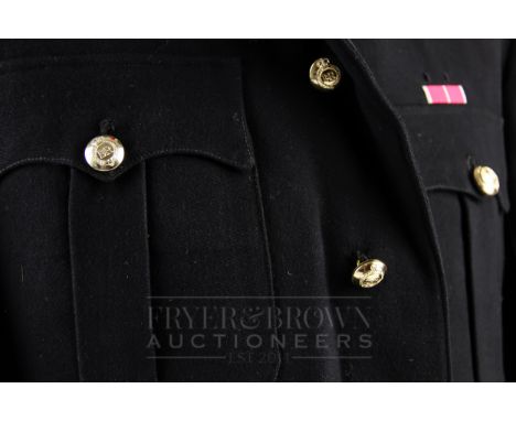 A British Army dress jacket, with military award insignia, 'Order of the British Empire' * Provenance available.