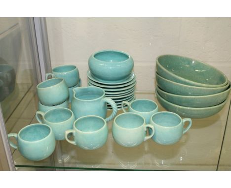 William John Marriner for Littlehampton Pottery, a turquoise glazed coffee service comprises ten cups, ten saucers, milk jug,