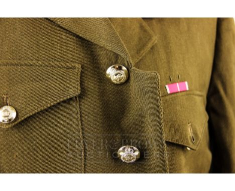 A Colonel's British Army khaki uniform, with insignia, two pips and a crown, jacket and trousers,  * Provenance available.