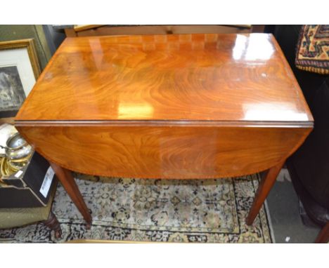 19th century mahogany and satin wood Pembroke table of typical design supported on ceramic castors&nbsp;