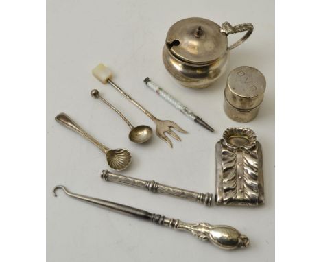 A silver mounted case with ruffle blouse decoration, together with two silver propelling pencils, and other silver items