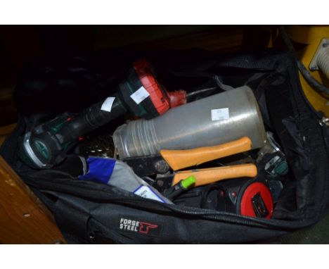 A holdall bag containing a Parkside battery drill and other hand tools&nbsp;(sold as seen)