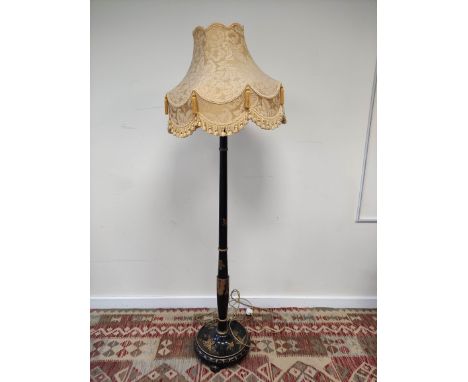 Early 20th century black lacquered standard lamp decorated with polychrome and gilt chinoiserie, with gold damask shade. Elec
