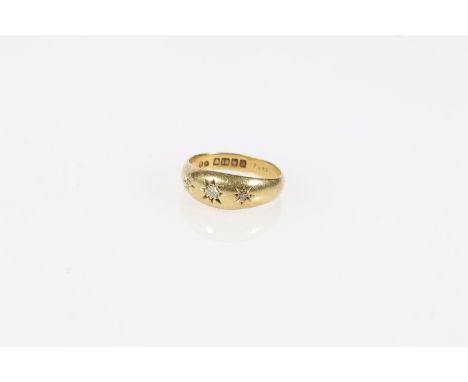 18ct yellow gold three stone diamond ring, Birmingham, size Q, 3.9g.Condition:Good overall condition with only minor  tear co