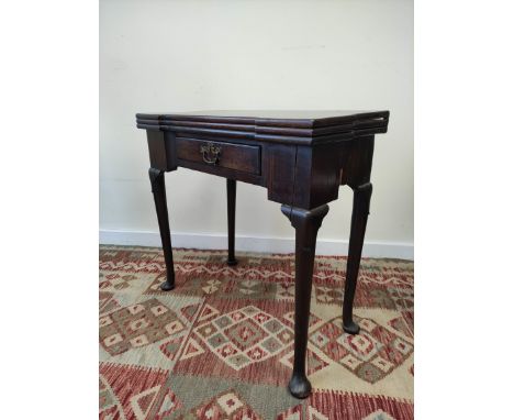 18th century mahogany card table, the shaped top opening&nbsp; to reveal four square wells and a later green felt lined inter