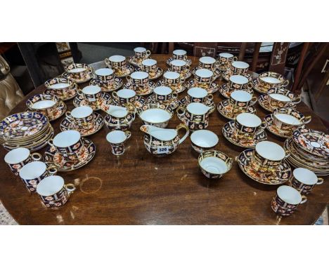 Eighty-six piece Royal Crown Derby Imari bone china part tea and coffee set, pattern 2451, comprising tea cups, coffee cans, 