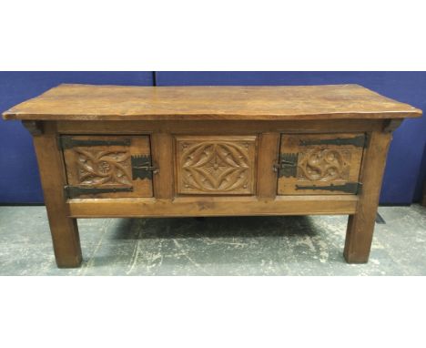 Robert "Mouseman" Thompson, oak sideboard, the rectangular top with scroll incised corners above pair of Gothic carved doors 