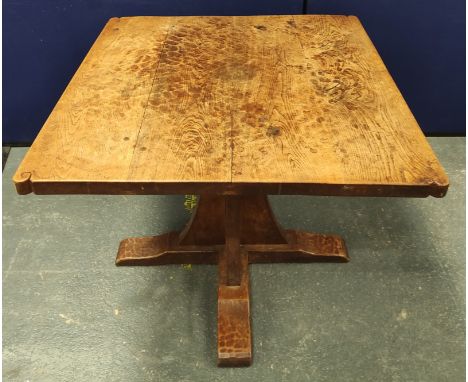 Robert "Mouseman" Thompson oak breakfast table, the square top with incised corner scrolls on curving flat quatreform support