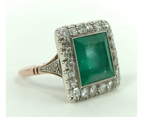 Diamond and emerald square cluster ring, the emerald approximately 10mm, surrounded by eight-cut diamonds, in gold, size 'O'.