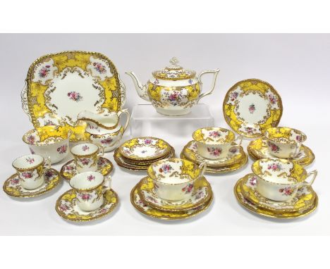 Coalport "Bat Wing" pattern part tea set with yellow ground, pattern no. 3086/E, comprising: teapot; milk jug; sugar bowl; tw