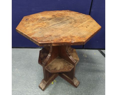 Robert "Mouseman" Thompson, oak centre table, the octagonal top on shaped flat supports with an undertier of four triangular 